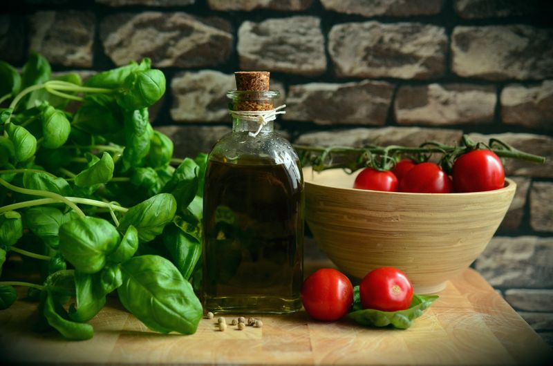Bruschetta board with tomatoes olive oil and fresh basil