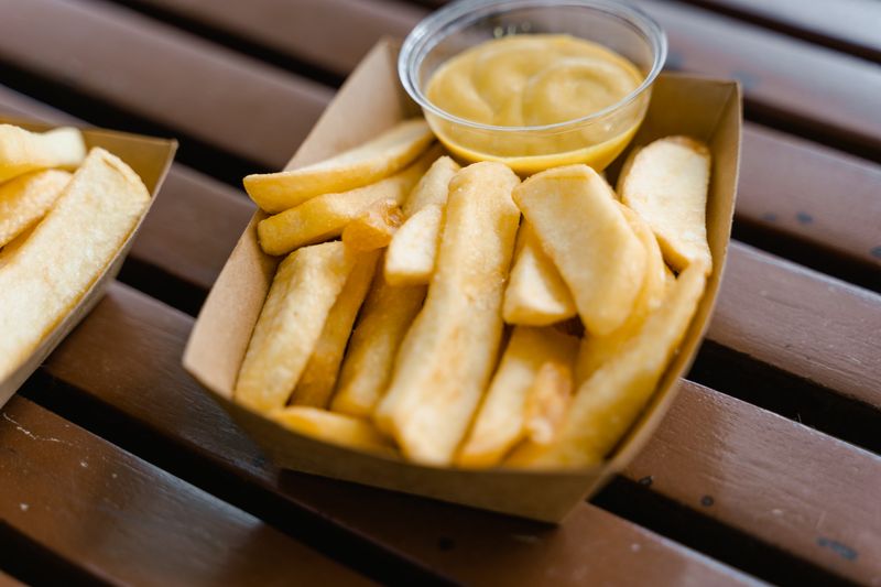 Crispy golden french fries with seasoning